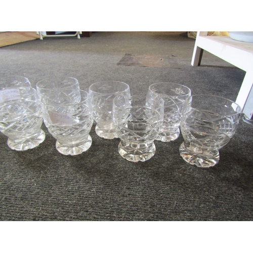 1543 - A set of twelve cut glass water tumblers