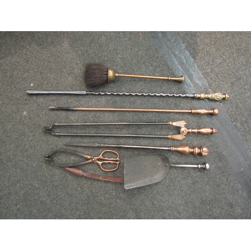 1562 - Three fire irons with copper handles (designs various), a copper brush, a short-handled shovel and a... 