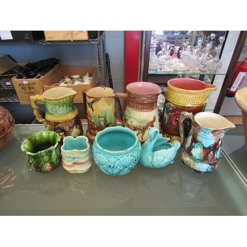 1581 - Six various Victorian majolica glazed jugs. Two similar fern pots and a swan (9- all damaged)