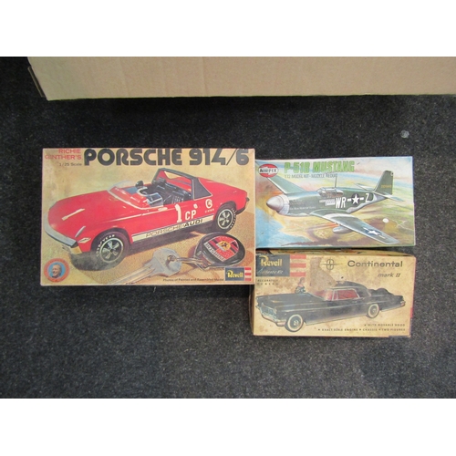 1609 - A box of mixed toys including boxed model cars, Revell kits etc.