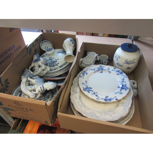 1217 - Two boxes of blue and white ceramics including meat plates, Delft vase, figures etc.