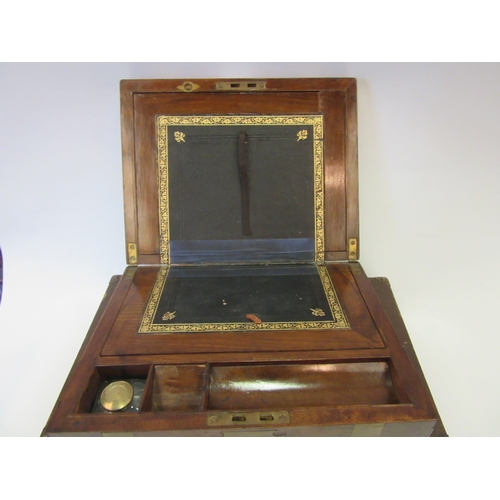 1226 - A brass banded writing box with tooled leather and inkwell interior together with a boxed clarinet, ... 