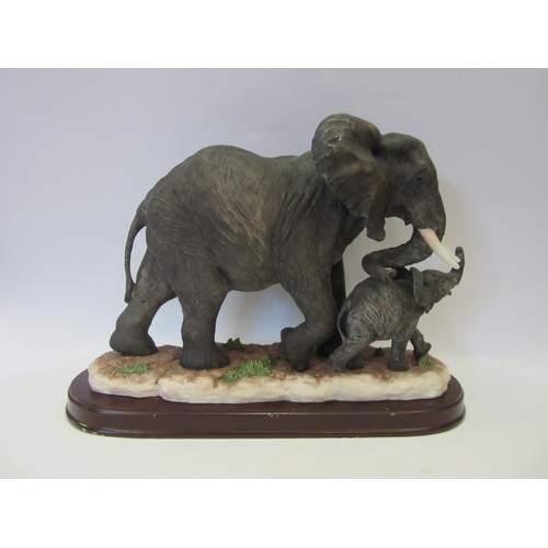 1231 - A large Leonardo Collection figure of elephant and calf, tusk a/f, 28cm tall