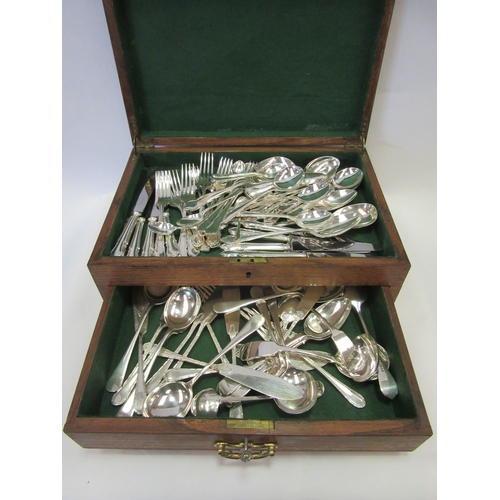 1236 - A quantity of silver plated cutlery in an oak canteen