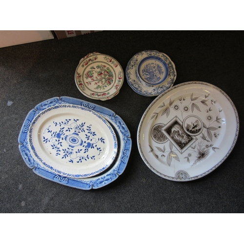 1248 - A large 19th Century blue and white willow pattern meat plate together with others and assorted plat... 