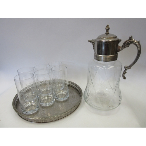 1253 - A glass water set comprising of silver plated and glass jug and a set of six matching glasses with e... 