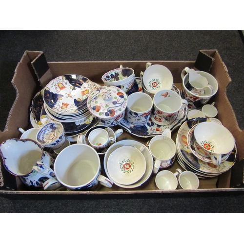 1302 - A composite part set of Victorian teawares painted with yellow and orange tulip, and blue and copper... 