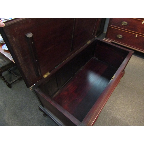 1104 - A large mahogany storage chest raised on cabriole legs to pad feet, 67cm tall x 122cm wide x 63cm de... 