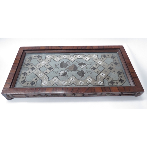 6092 - A Regency rosewood table stand with bead work panel to centre, decorative embellished sides, 5cm x 5... 