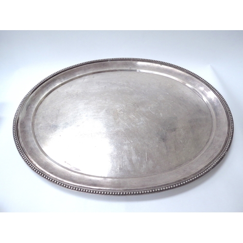 6069 - A Netherlands oval silver tray with raised rim, beaded border, marked 835, 52cm x 40cm, 1747g