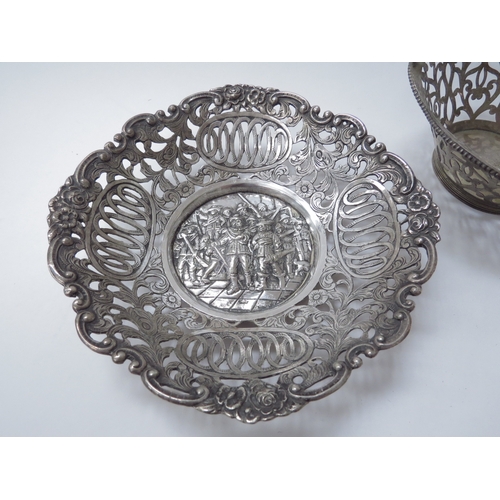 6449 - A Netherlands silver pierced basket assayed in Schoonhoven and white metal pierced dish marked Silfo... 