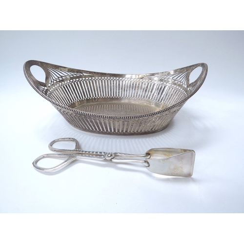 6450 - A Netherlands silver pierced bread basket assayed in Amsterdam, fineness 835, 9.5cm x 27cm x 19cm, 3... 