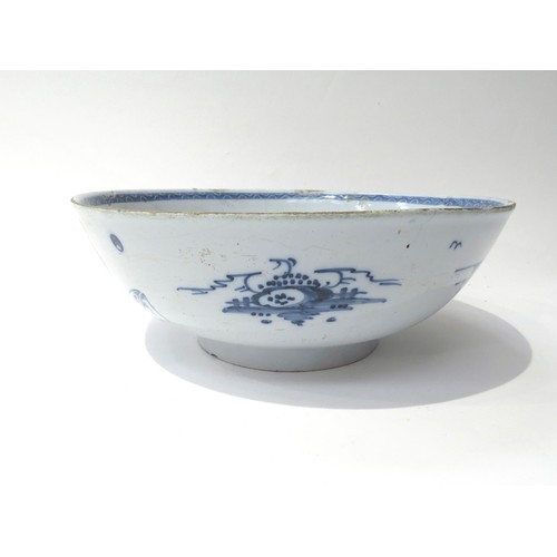 6265 - An 18th Century porcelain blue & white bowl, the exterior decorated with narrative figures, some dam... 