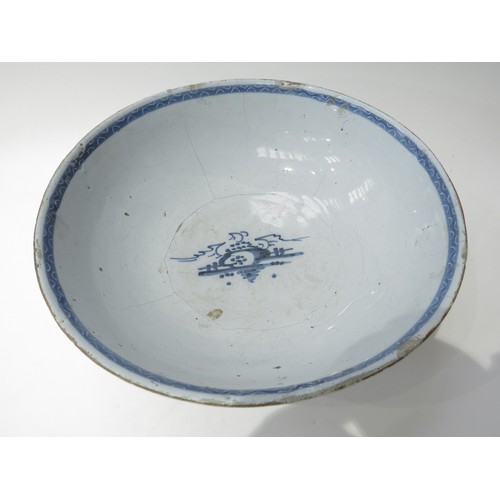 6265 - An 18th Century porcelain blue & white bowl, the exterior decorated with narrative figures, some dam... 