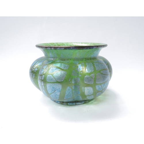 6028 - A Loetz green iridescent glass melon-fluted bowl, approximately 16cm diameter, polished pontil to ba... 