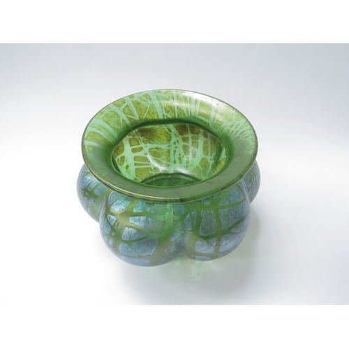 6028 - A Loetz green iridescent glass melon-fluted bowl, approximately 16cm diameter, polished pontil to ba... 