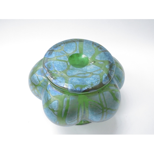 6028 - A Loetz green iridescent glass melon-fluted bowl, approximately 16cm diameter, polished pontil to ba... 