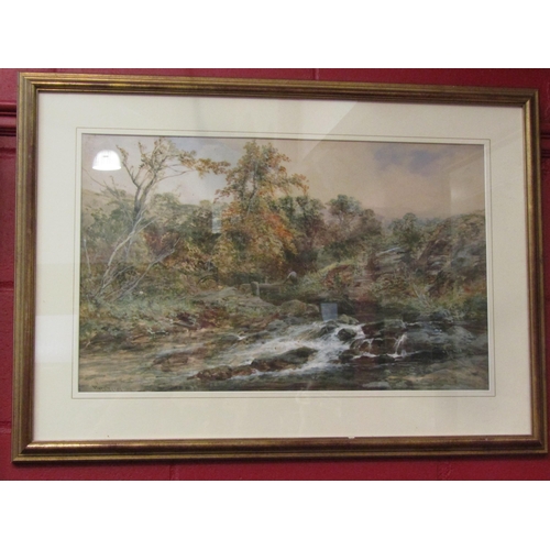 4132 - WILLIAM WIDGERY (1826-1893): A watercolour depicting gent by river in wooded landscape.  Signed lowe... 