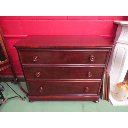 4135 - A Circa 1850 mahogany round cornered chest of three drawers over turned feet, 94cm tall x 110cm wide... 