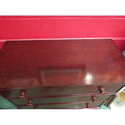 4135 - A Circa 1850 mahogany round cornered chest of three drawers over turned feet, 94cm tall x 110cm wide... 