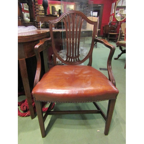 4157 - A 19th Century mahogany Hepplewhite revival open armchair the shield shape backrest with fretwork ce... 