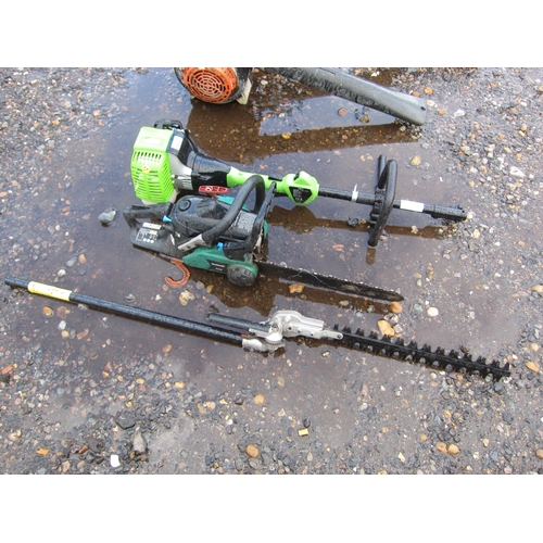 3397 - A Qualcast chainsaw and a long reach hedge cutter