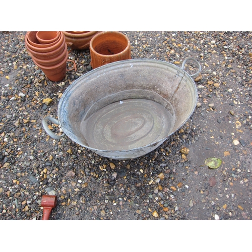 3428 - A galvanised twin handled bath