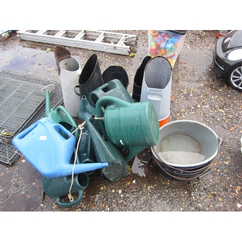 3444 - Six coal scuttles, a quantity of plastic watering cans and three horse feeding buckets