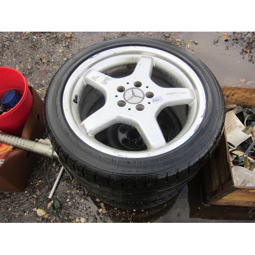 3472 - An alloy wheel and a steal rim with tyres