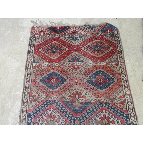 6461 - A Turkoman tribal handwoven rug with hook lozenge motif, red, blue, whites, 218cm x 107cm