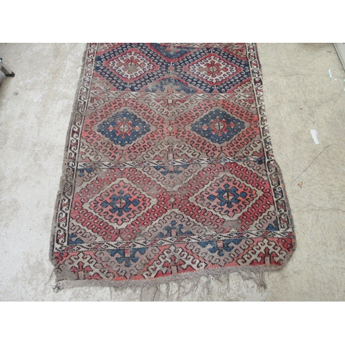 6461 - A Turkoman tribal handwoven rug with hook lozenge motif, red, blue, whites, 218cm x 107cm