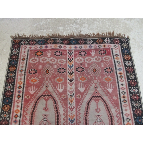 6463 - An early to mid 20th Century Kilim handwoven tribal rug with two matching panels to centre field, 16... 