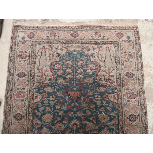 6468 - A Persian prayer rug the central field decorated with vase and sprawling flowers, 132cm x 88cm