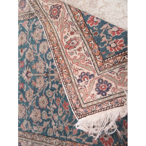 6468 - A Persian prayer rug the central field decorated with vase and sprawling flowers, 132cm x 88cm