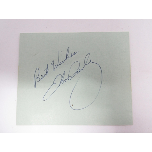 7281 - ELVIS PRESLEY: An autograph book page signed in blue ink 