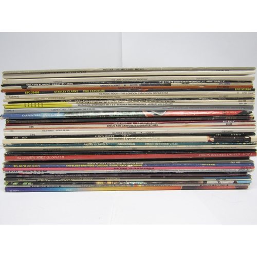 7117 - A varied collection of LPs including Talk Talk - 'The Party's Over' (EMC 3413), Queen - 'A Night At ... 