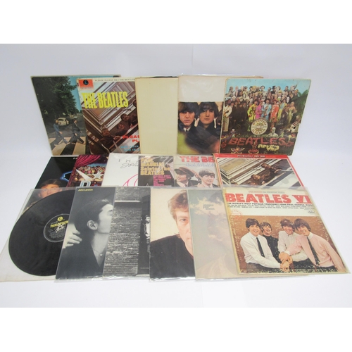 7108 - THE BEATLES: A collection of Beatles and related LPs to include 'The Beatles' (White album) with pos... 