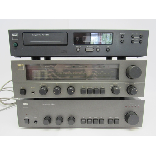 7466 - Hi-fi - A group of three NAD hi-fi separates to include 3020A stereo amplifier, 502 CD player and 70... 