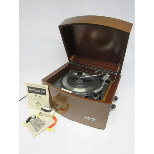 7371 - A Pye Black Box mahogany cased record player with Garrard turntable, with associated instruction boo... 