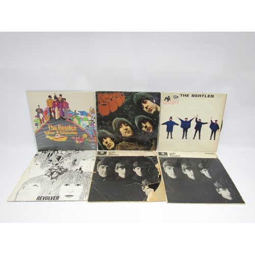 7148 - THE BEATLES: A group of LPs to include 'Yellow Submarine' LP, reissue with no red lines to back cove... 