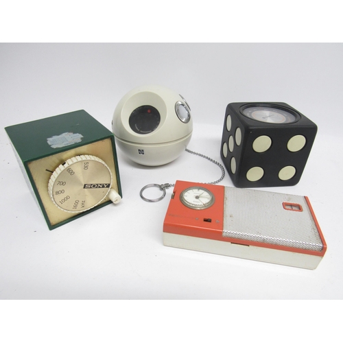 7477 - A group of four vintage portable novelty radios to include National Panasonic R-70 Panapet 'ball and... 