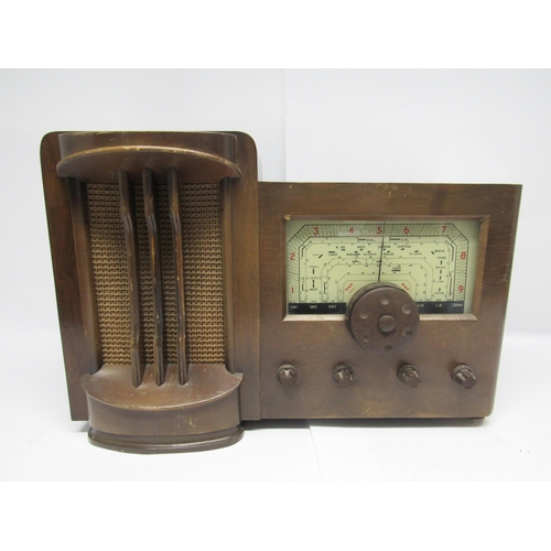 7316 - A Radio Acoustic Products (R.A.P.) Ltd. model 646 valve radio in Art Deco wooden case with Bakelite ... 