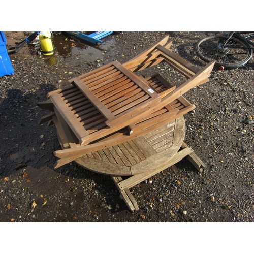 3512 - A hardwood garden table with four chairs