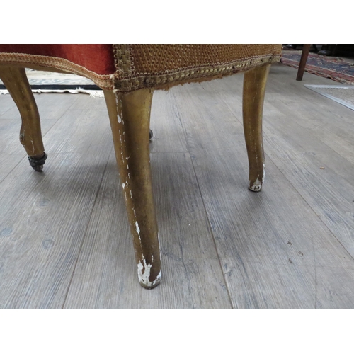 6004 - A Victorian spoon back upholstered bedroom chair on short gilded wood legs