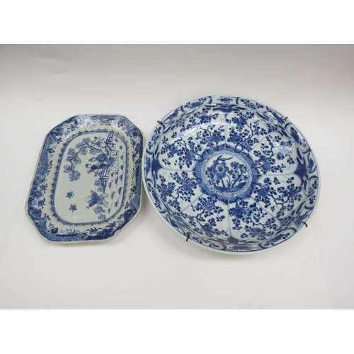 6008 - A 19th Century Chinese blue and white bowl, damage present, with conch shell mark to back, 35cm diam... 