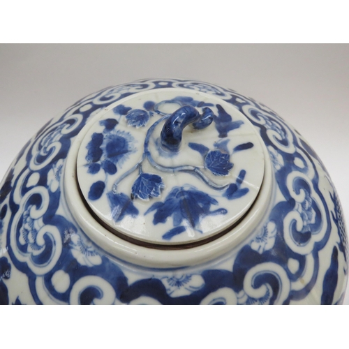 6009 - A Chinese blue and white lidded bulbous jar with double dragon detail with four claws, blue four cha... 