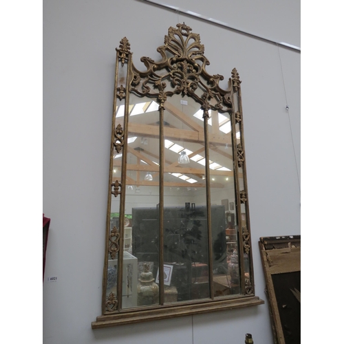 6017 - A 20th Century cast metal gothic wall mirror with acanthus detail, damage to top finial 149cm x 81cm