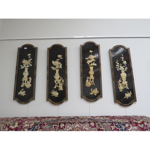 6022 - Four 20th Century Japanese lacquered screens with high relief detail, depicting floral displays, 91.... 