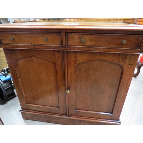 6080 - A late George III rosewood side cabinet the pierced brass three quarter gallery with ivory inlaid to... 