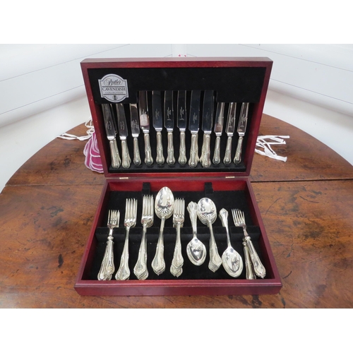 6098 - A canteen of James Dixon & Sons Ltd silver cutlery for eight place settings, foliate detail includin... 